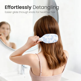 AIMIKE brush detangling wet hair gently, minimizing breakage and scalp discomfort