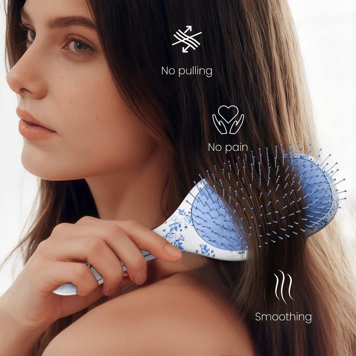 AIMIKE brush held in hand to show scale and ergonomic paddle shape for even pressure
