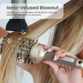 AIMIKE brush next to hand to show 2.1-inch barrel scale for medium to long hair