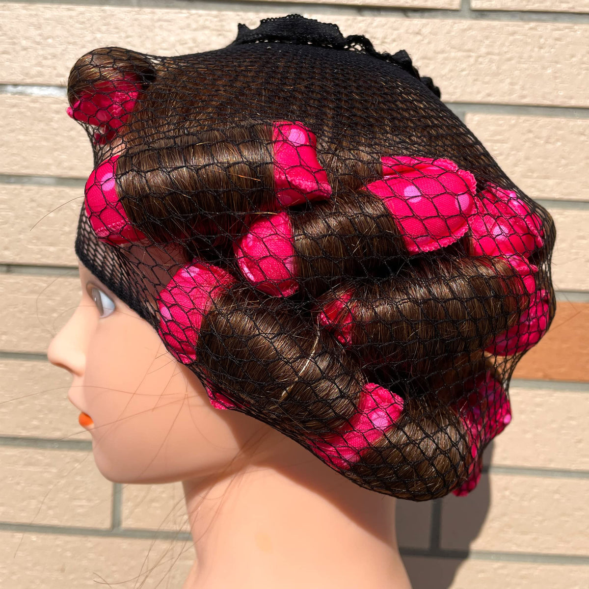 Aimin Hair curlers beside a ruler showing scale and suitability for long hair