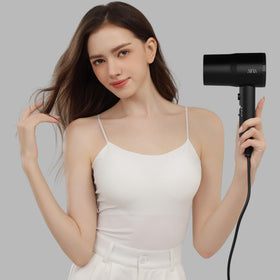 AINA hair dryer in bathroom setting demonstrating everyday use and quick drying benefit
