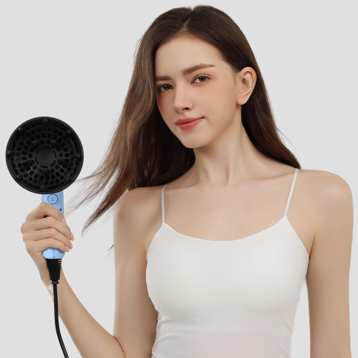 AINA hair dryer in bathroom styling scene showing everyday styling convenience
