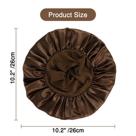 Aiphamy bonnet beside adult hand shows child size and scale