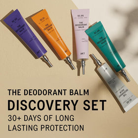 AKT cream texture on fingertip showing smooth, moisturizing balm consistency