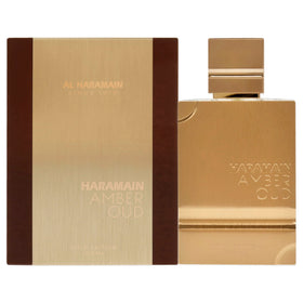 Al Haramain front bottle view showing elegant amber-oud gold packaging and presence