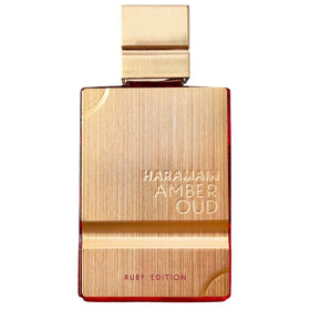 Al Haramain 60ml bottle beside a coin for scale, clarifies compact travel friendly size
