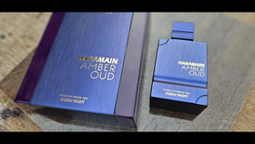 Al Haramain amber and oud visual suggesting warm resinous drydown benefit