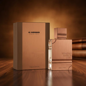 al haramain bottle in hand showing 2 oz scale for size awareness benefit