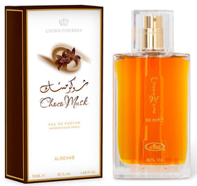 Al-Rehab Choco Musk spray close-up showing nozzle and mist for lasting gourmand scent