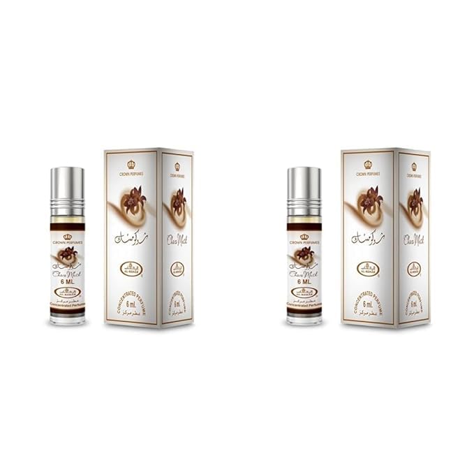 Al-Rehab rollerball close-up showing applicator tip and concentrated oil for easy touch-ups