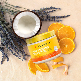 Alaffia applying shea butter to elbow illustrating targeted moisturizing for very dry skin