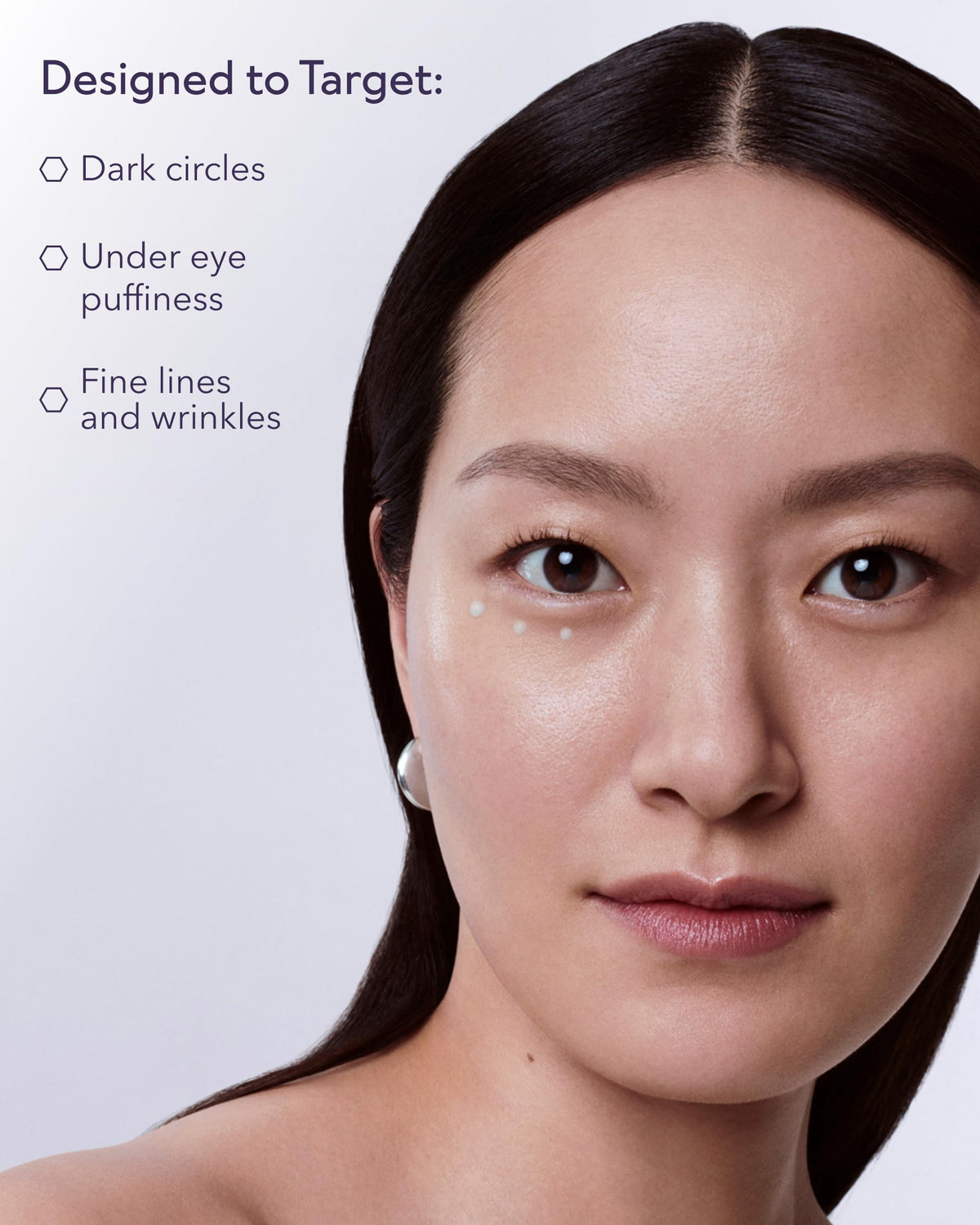 ALASTIN Skincare cream on hand shows lightweight feel and easy absorption