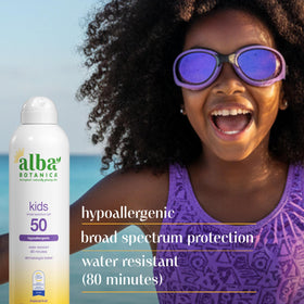 Alba Botanica 5 fl oz bottle beside a toy to show portable size for on-the-go use