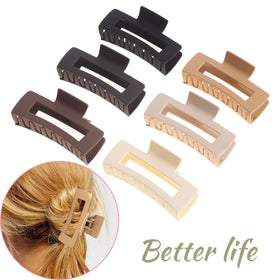Woman wearing Alemaky large clip in a casual bun, showing secure hold and everyday styling benefit