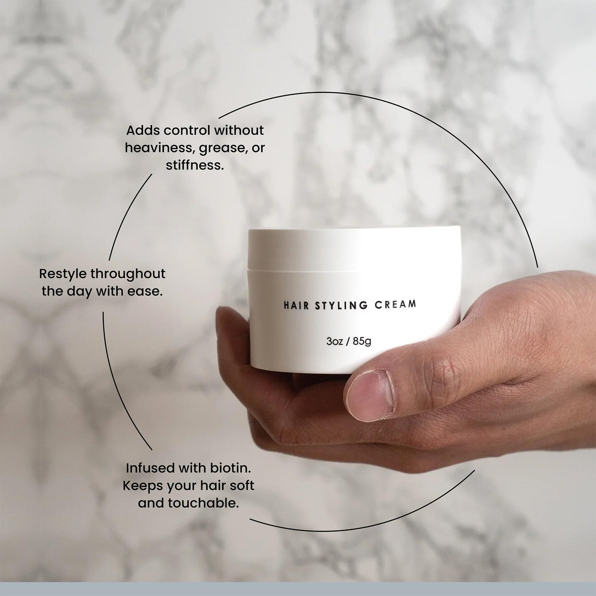 Alex Costa product on hand showing small pea-sized amount for controlled styling