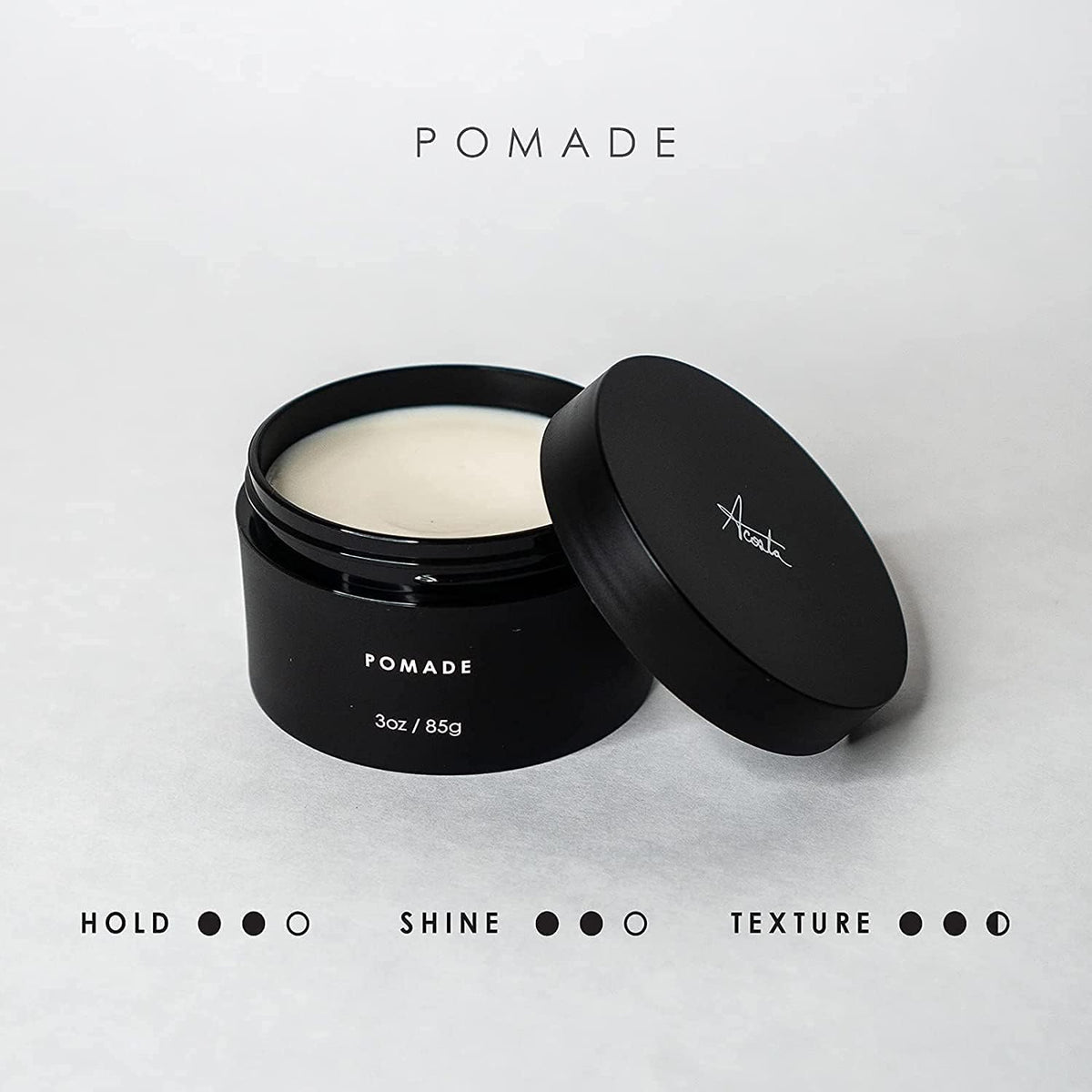 Alex Costa pomade being rubbed between palms to demonstrate easy application benefit