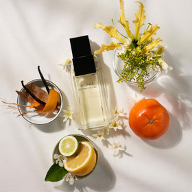ALFRED SUNG close-up of glass bottle highlighting texture and luxury finish