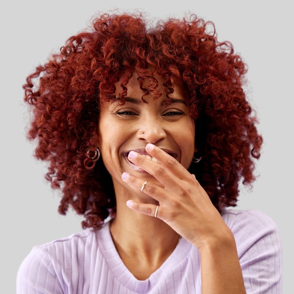 All About Curls pump dispensing airy foam texture for lightweight hold