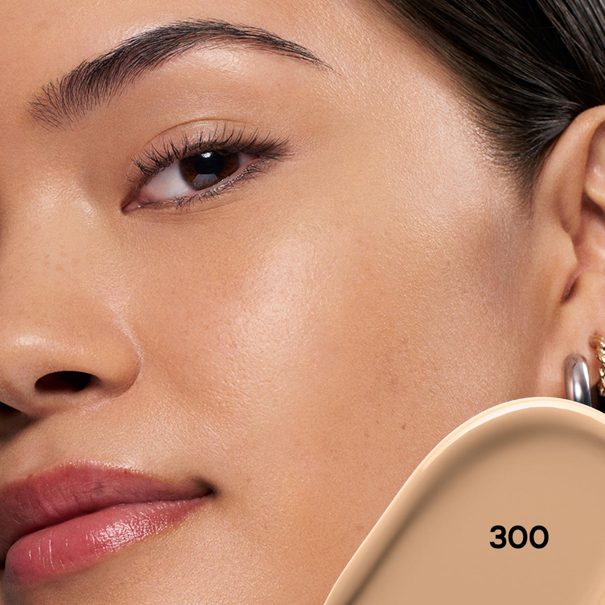 Almay concealer swatch on skin demonstrating blendable coverage