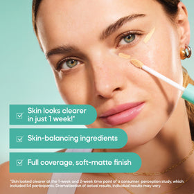 Almay concealer being applied with fingertip for targeted concealment