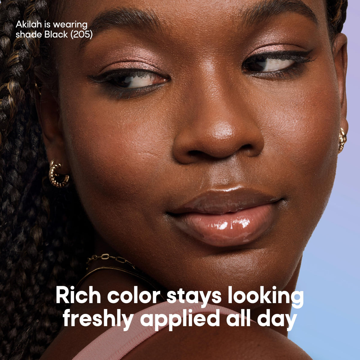 Almay eyeliner pencil swatch on arm displaying long-lasting brown topaz color