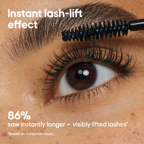 Almay mascara on a bathroom vanity illustrating natural makeup routine compatibility