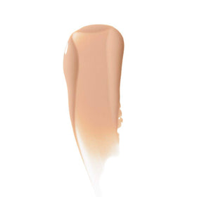 Almay swatch on hand showing blendable texture and luminous benefit