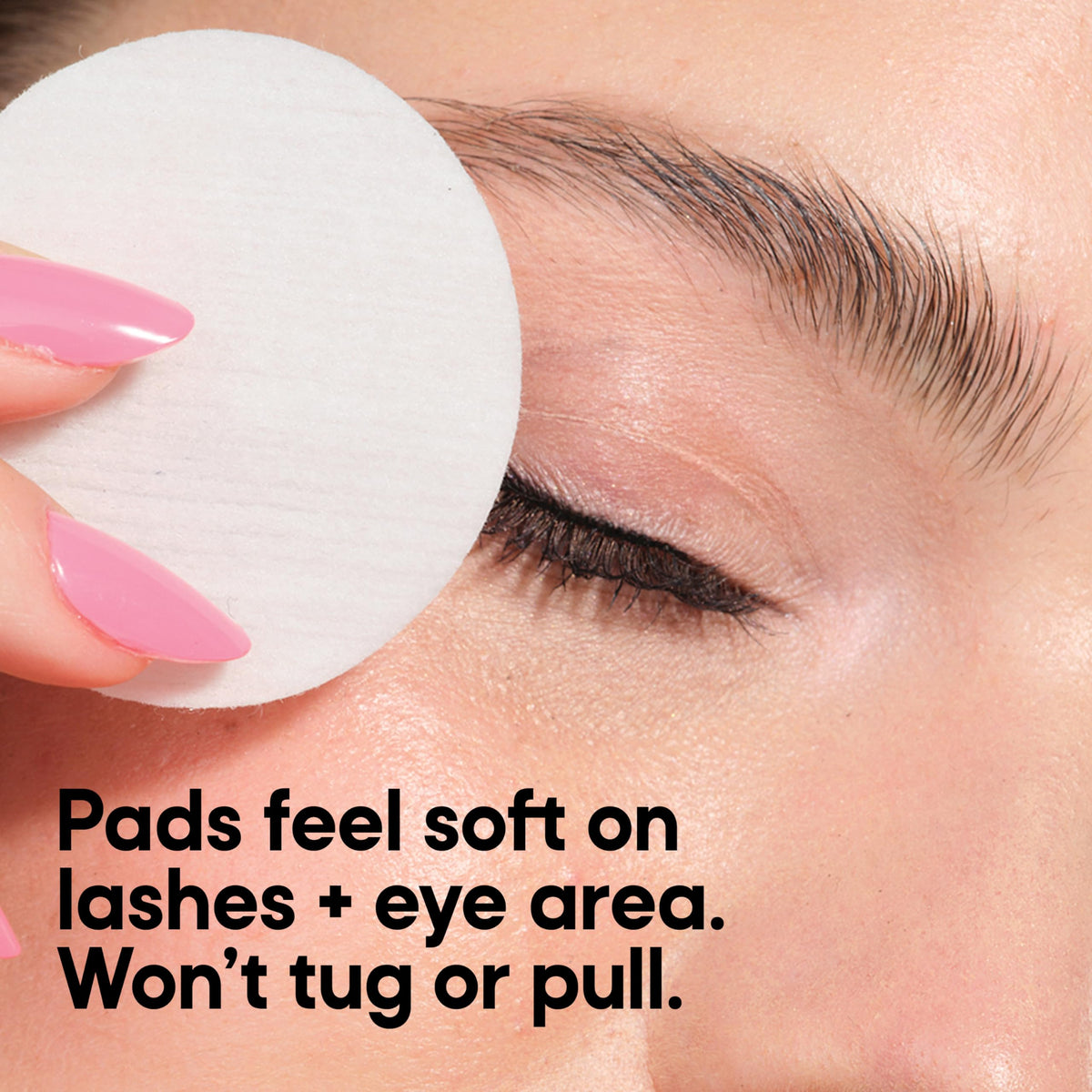 Almay pads scale against a hand to show size and single-use convenience