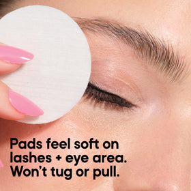 Almay pads scale against a hand to show size and single-use convenience