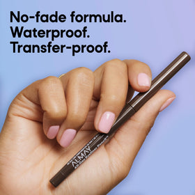 Almay pencil beside makeup kit showing size and portability for everyday use