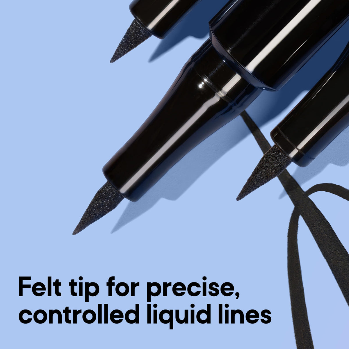Almay ink stroke on paper showing rich black pigment and smooth payoff