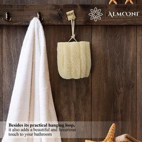ALMOONI loofah placed in a bathroom scene conveying a relaxing spa benefit