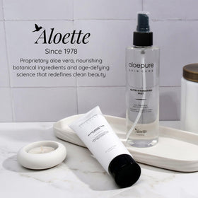Aloette size comparison in hand demonstrating portable 8 oz convenience
