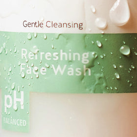 Alpha close-up of pump and label highlighting ingredients and usage