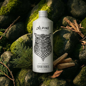 Alpine Provisions on bathroom shelf in lifestyle setting promoting spa-like routine
