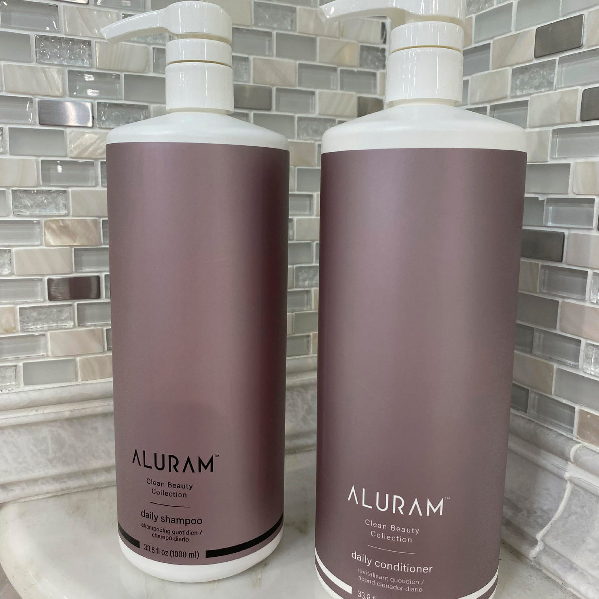 ALURAM label close-up highlighting ingredients and clean-beauty benefits
