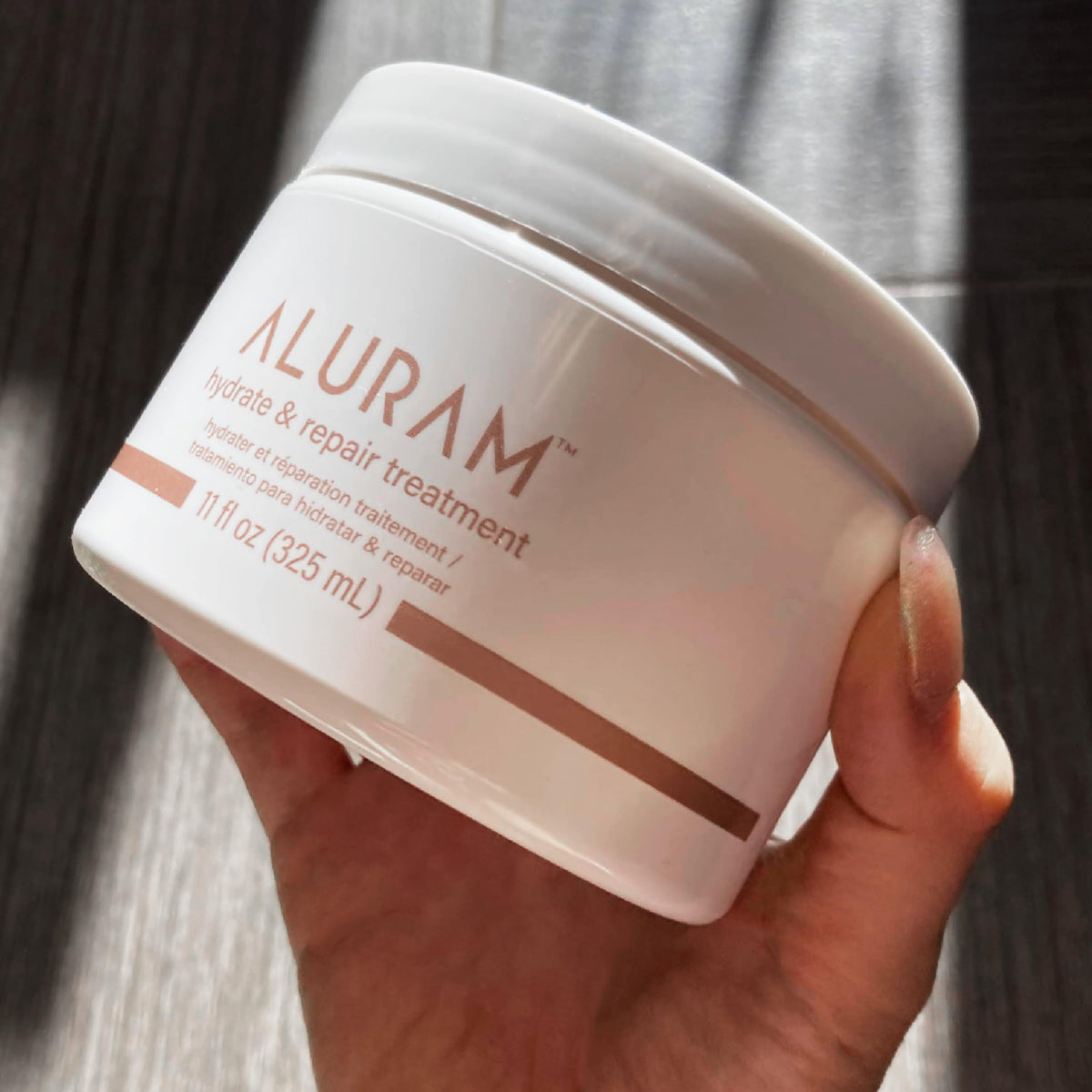 ALURAM pump dispensing creamy texture highlighting easy application and rich moisture delivery