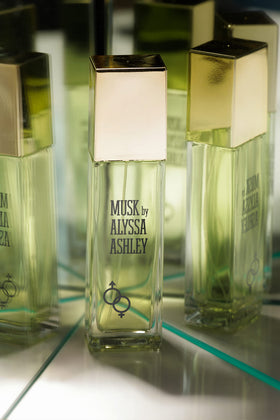 ALYSSA ASHLEY flatlay with box and bottle illustrating designer packaging and gift-ready appeal