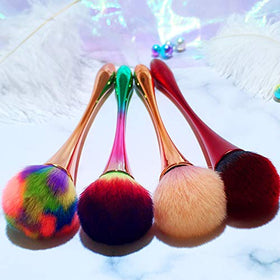 AM RONG MAGIC brush held in hand to show size and scale for face-wide coverage