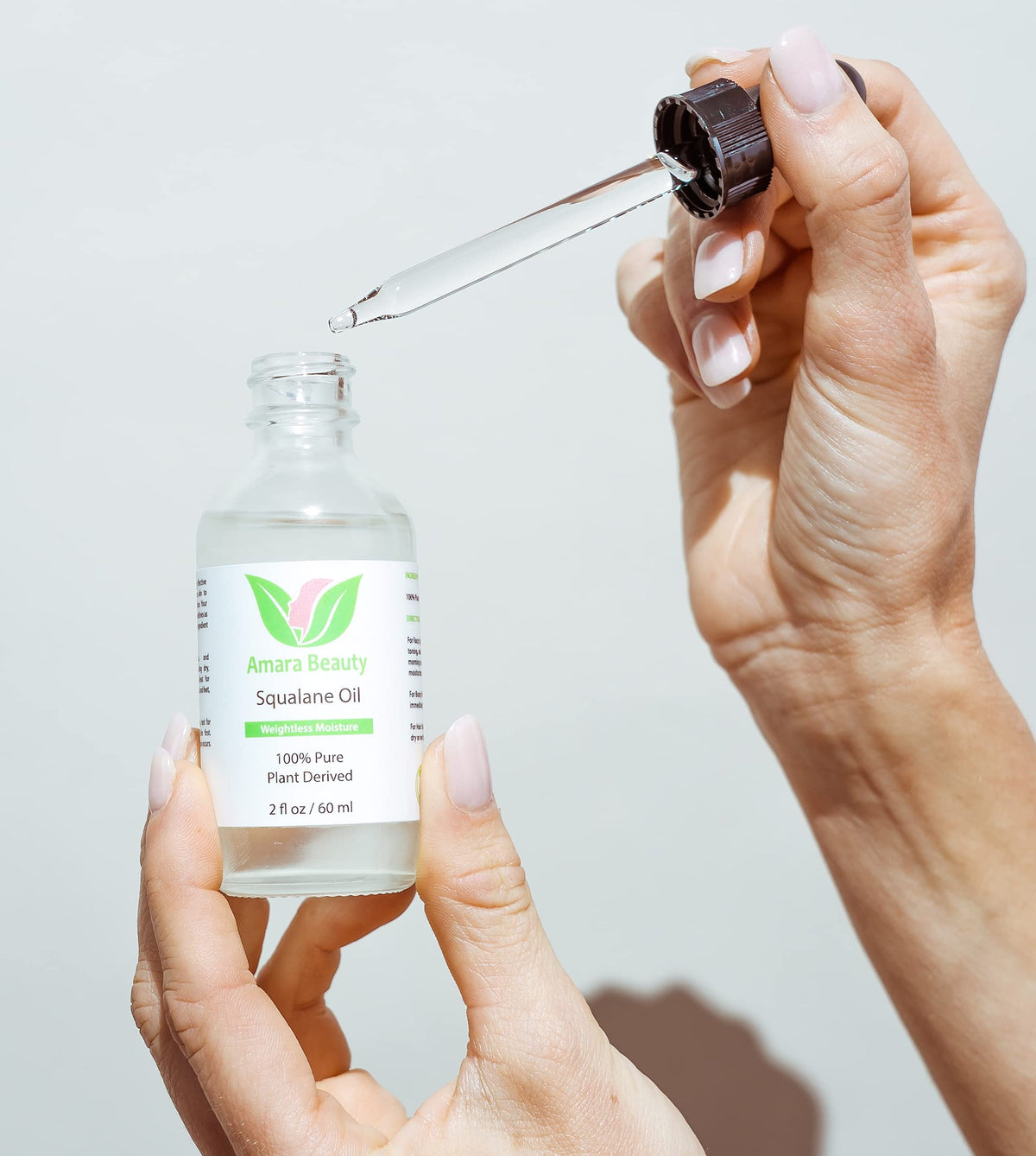 Amara Beauty treating dry hair ends with squalane for added shine and split end care