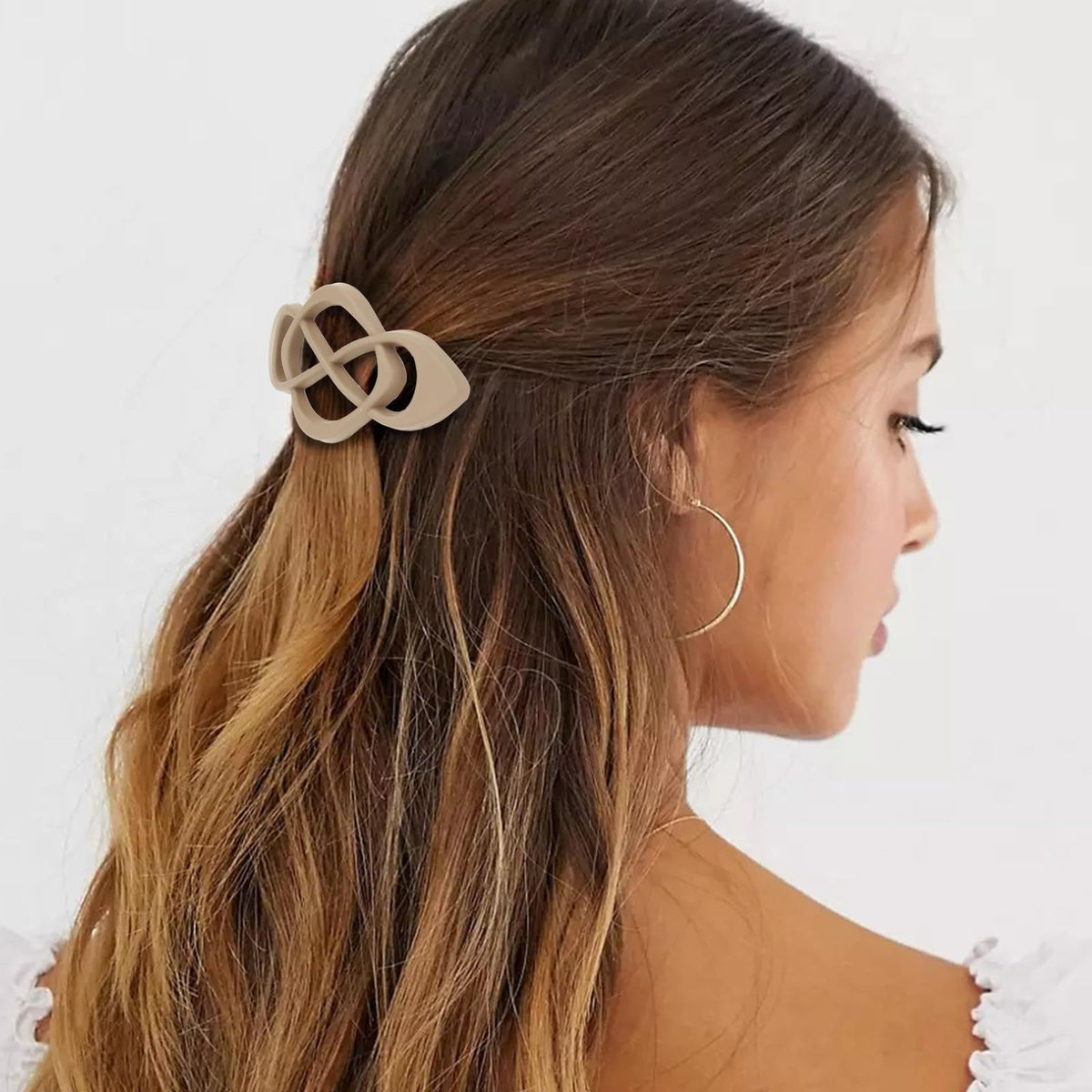 Amariver clip holding a full updo illustrating strong grip for thicker hair