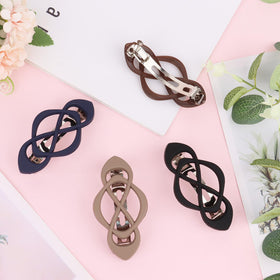 Amariver barrettes arranged as a gift on dresser conveying thoughtful presentability
