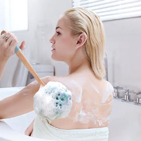 AmazerBath handheld sponge detail showing soft mesh for targeted exfoliation and comfort