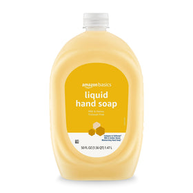 Amazon Basics close-up label highlighting milk and honey scent and triclosan-free formula benefits