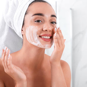 Bottle displayed on bathroom counter in routine setting to suggest daily skincare integration