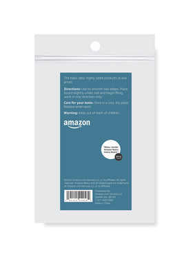 Amazon Basics nail file held in hand to show size and comfortable handling benefit