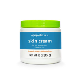 Amazon Basics open jar with cream revealing smooth, rich consistency