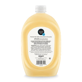 Amazon Basics size comparison with a hand to show large 50 fl oz capacity benefit