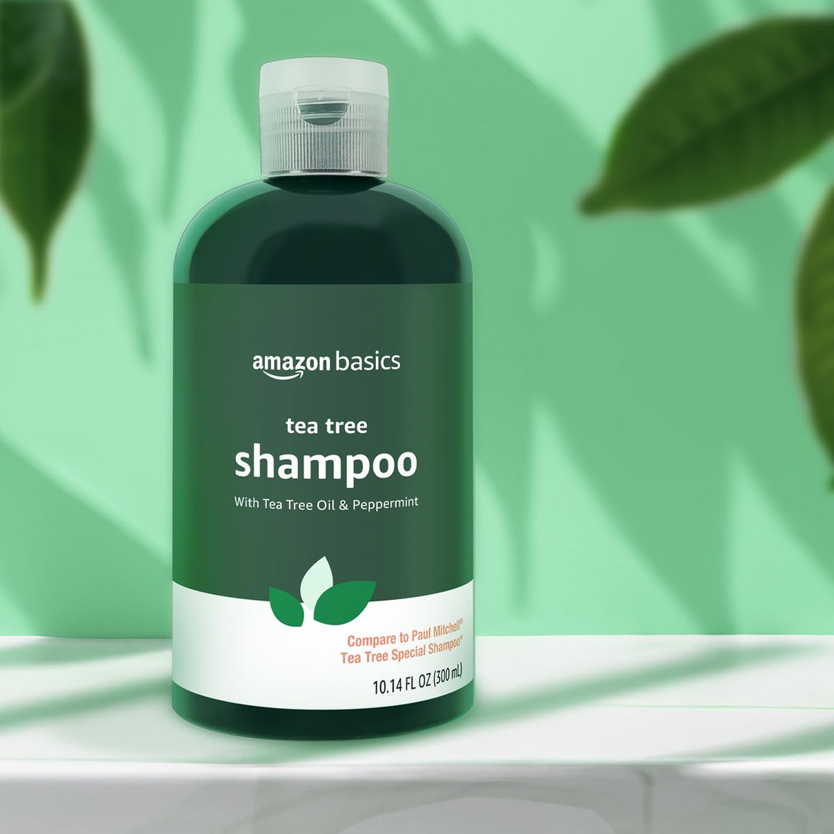 Shampoo bottle on bathroom shelf with towel, Amazon Basics for everyday shower routines