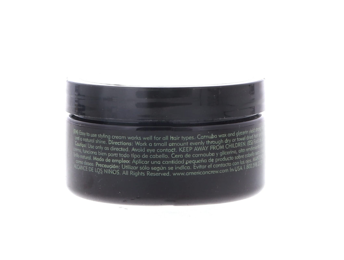 American Crew product being applied to hair from hand demonstrating controllable styling benefit